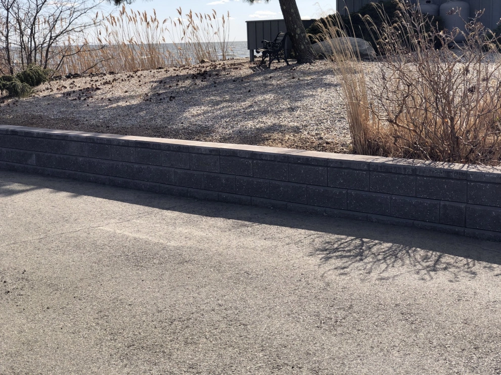 Retaining Wall Installation by Tate's Property Care, LLC - Photo 11