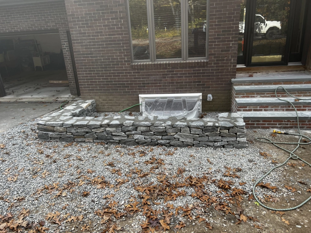 Retaining Wall Installation by Tate's Property Care, LLC - Photo 9