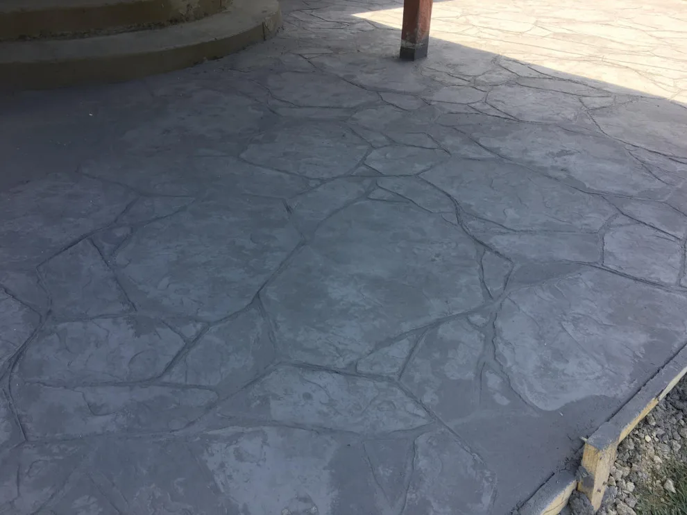 Stamped patio extension for the backyard by Medina Decorative Concrete LLC - Photo 7