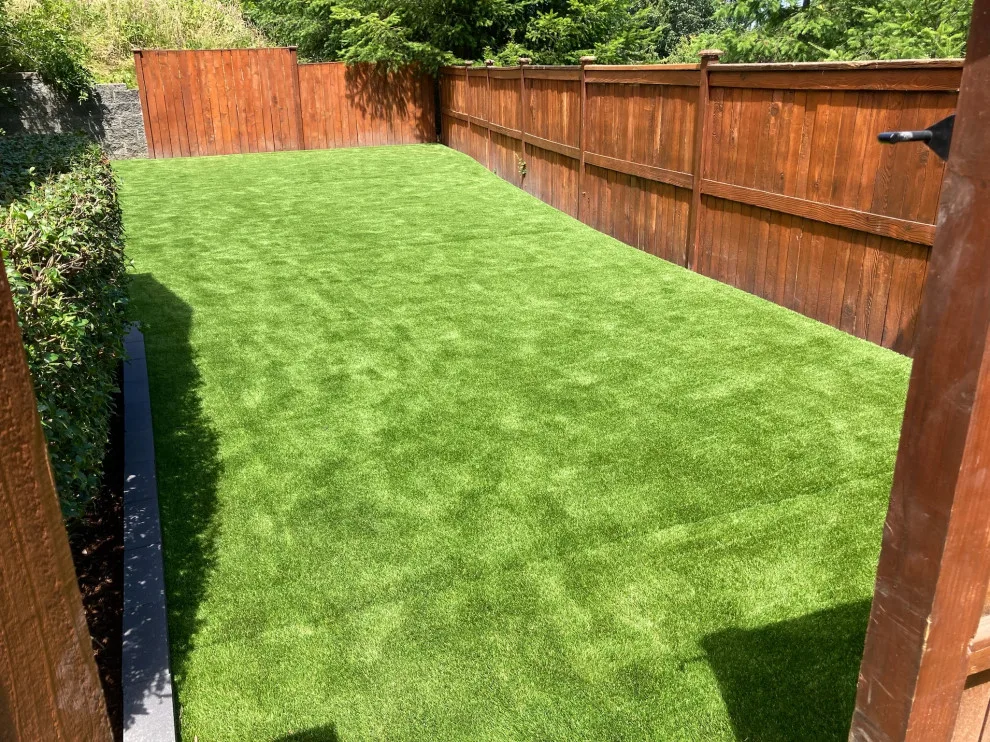 Synthetic Turf - Landscape Design by Custom Pavers & Design - Photo 13