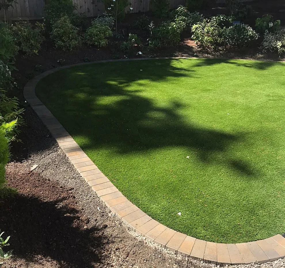 Synthetic Turf - Landscape Design by Custom Pavers & Design - Photo 4