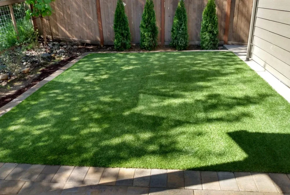 Synthetic Turf - Landscape Design by Custom Pavers & Design - Photo 9