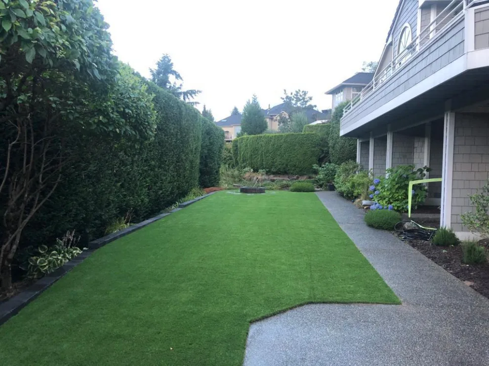 Synthetic Turf - Landscape Design by Custom Pavers & Design - Photo 7