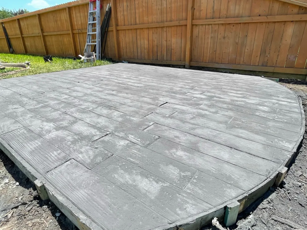 Stamped Back Patio by Flores Concrete - Photo 17