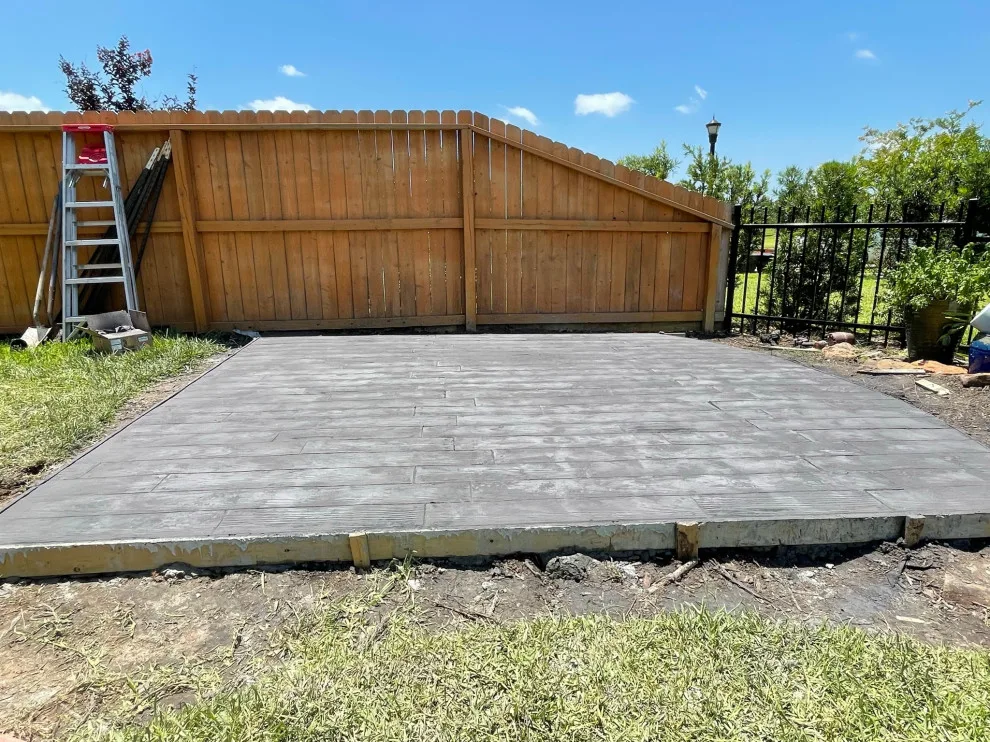 Stamped Back Patio by Flores Concrete - Photo 30