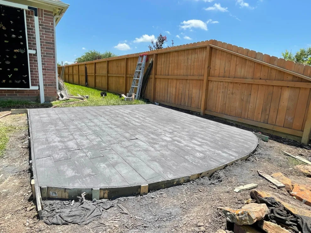 Stamped Back Patio by Flores Concrete - Photo 15
