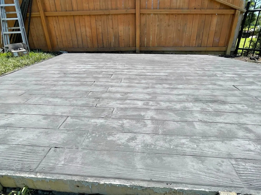 Stamped Back Patio by Flores Concrete - Photo 11