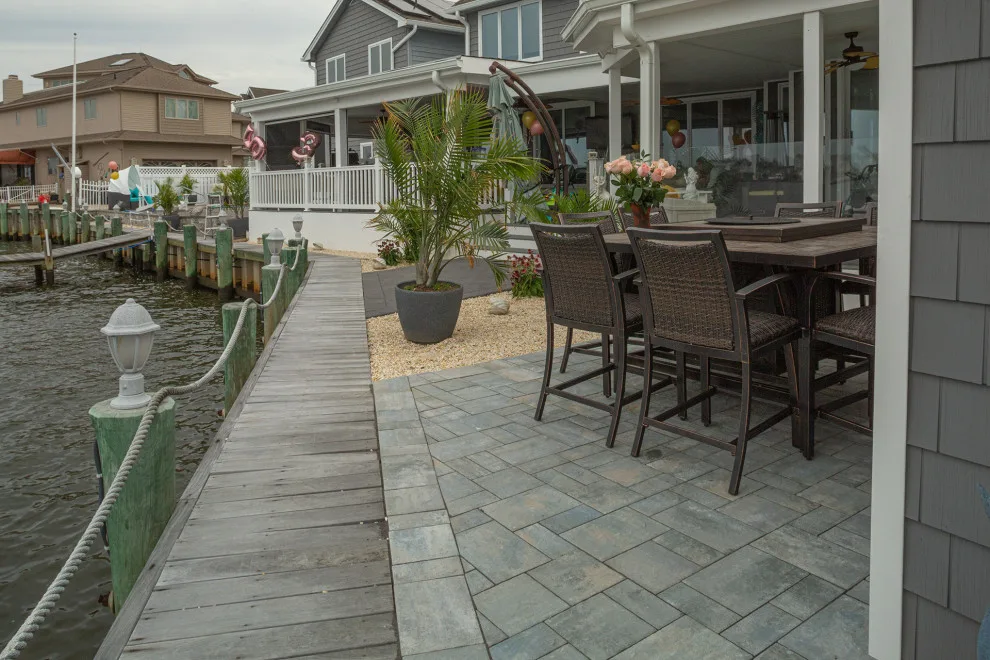 Waterside backyard retreat by Cambridge Pavingstones With ArmorTec - Photo 2