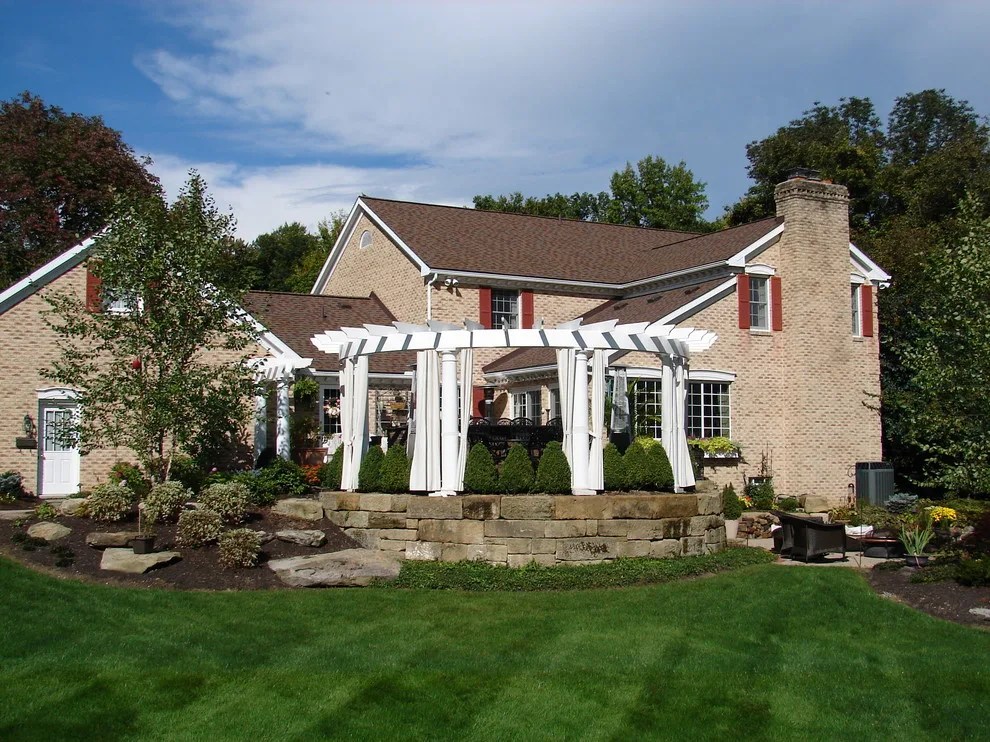 Backyard Oasis in Bath, Ohio by Land Creations Landscaping Inc. - Photo 2