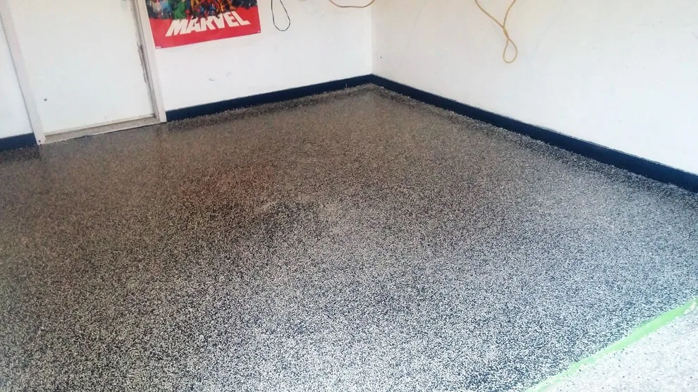 Brett's cellar and garage flooring by Moser Contracting - Photo 2