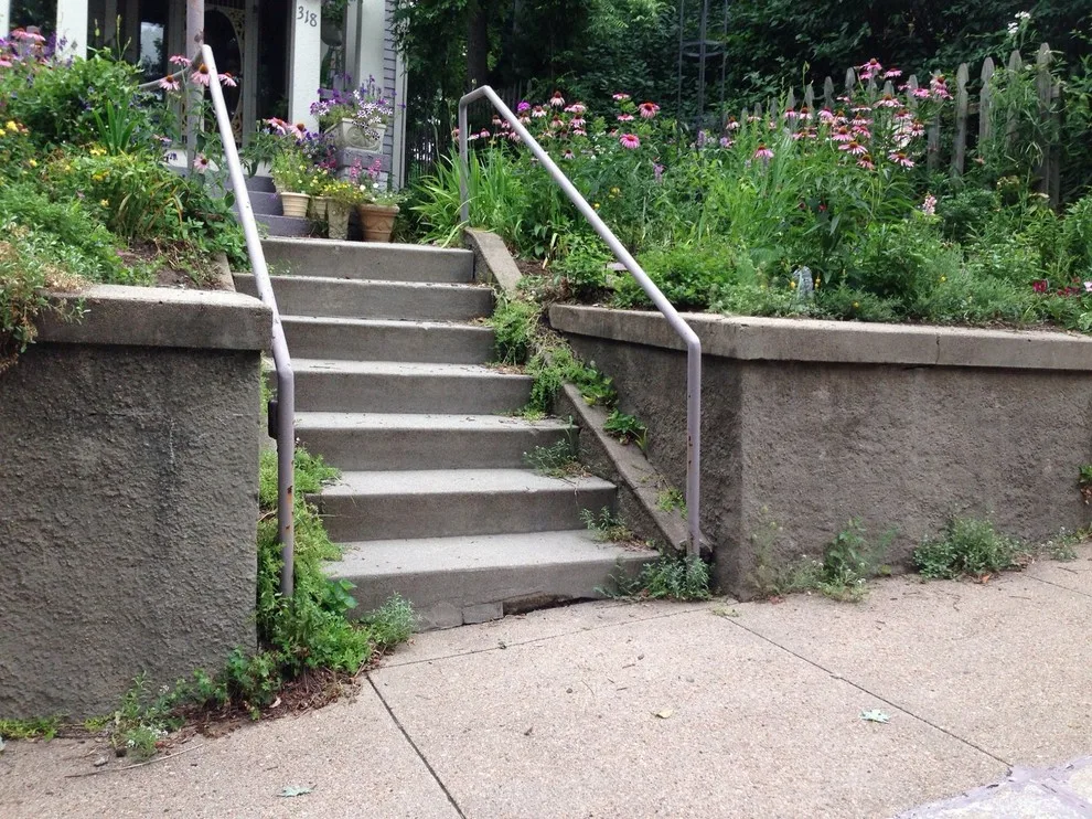 Stone Retaining Wall with Cobblestones by Markuson Mark III Construction - Photo 6