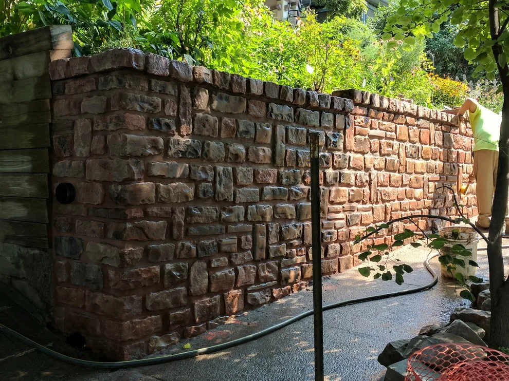 Stone Retaining Wall with Cobblestones by Markuson Mark III Construction - Photo 14