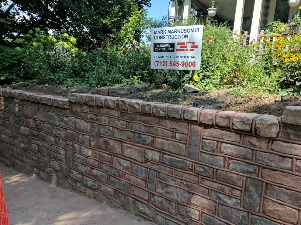 Stone Retaining Wall with Cobblestones by Markuson Mark III Construction - Photo 12