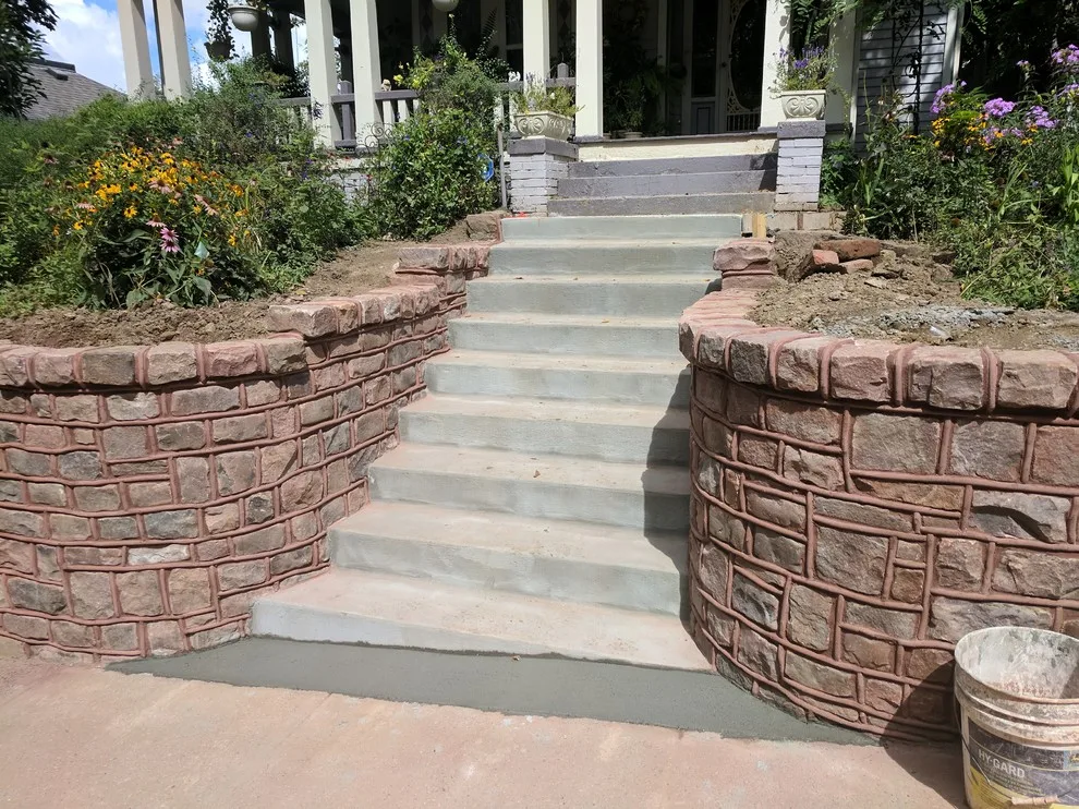 Stone Retaining Wall with Cobblestones by Markuson Mark III Construction - Photo 16