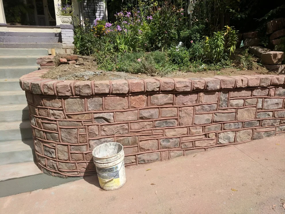Stone Retaining Wall with Cobblestones by Markuson Mark III Construction - Photo 15