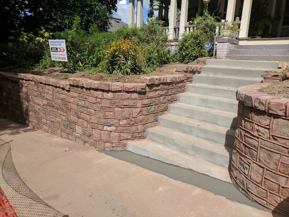 Stone Retaining Wall with Cobblestones by Markuson Mark III Construction - Photo 8