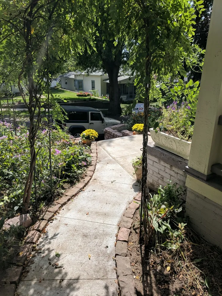 Stone Retaining Wall with Cobblestones by Markuson Mark III Construction - Photo 10