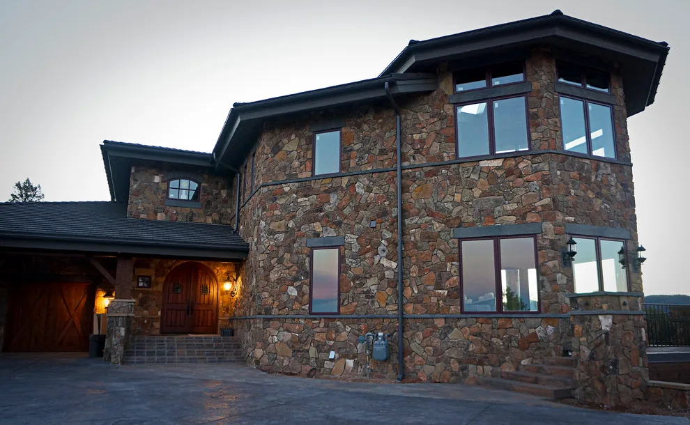 Bespoke Rustic Hilltop Estate | Woodland Park, CO by Sundance Masonry, LLC - Photo 7