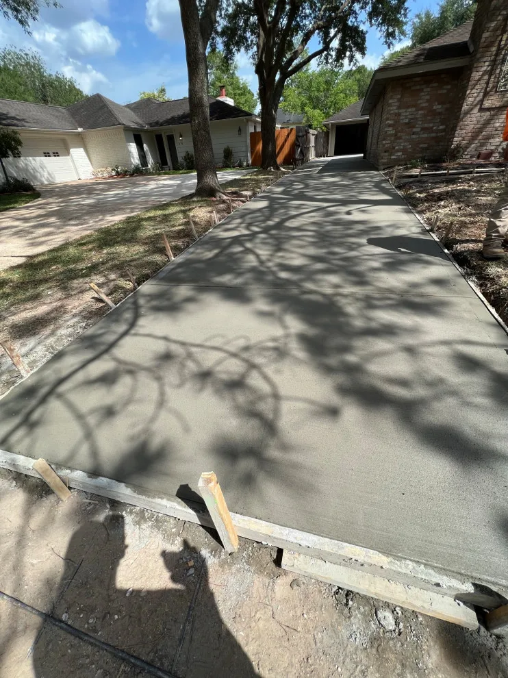 Stamped Patio Driveway by Flores Concrete - Photo 23
