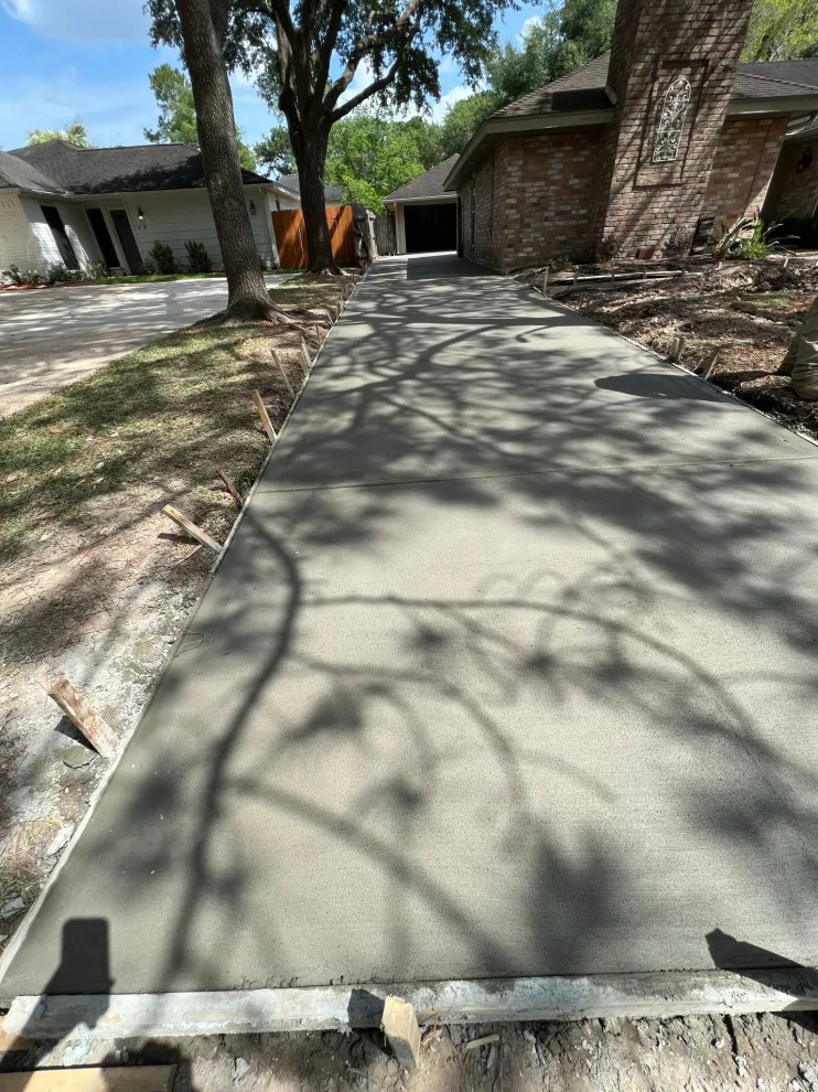Stamped Patio Driveway by Flores Concrete - Photo 40