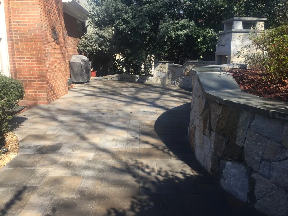 Dunwoody compact outdoor space featuring a fireplace by PaverStone Construction And Greenmark Landscaping - Photo 9