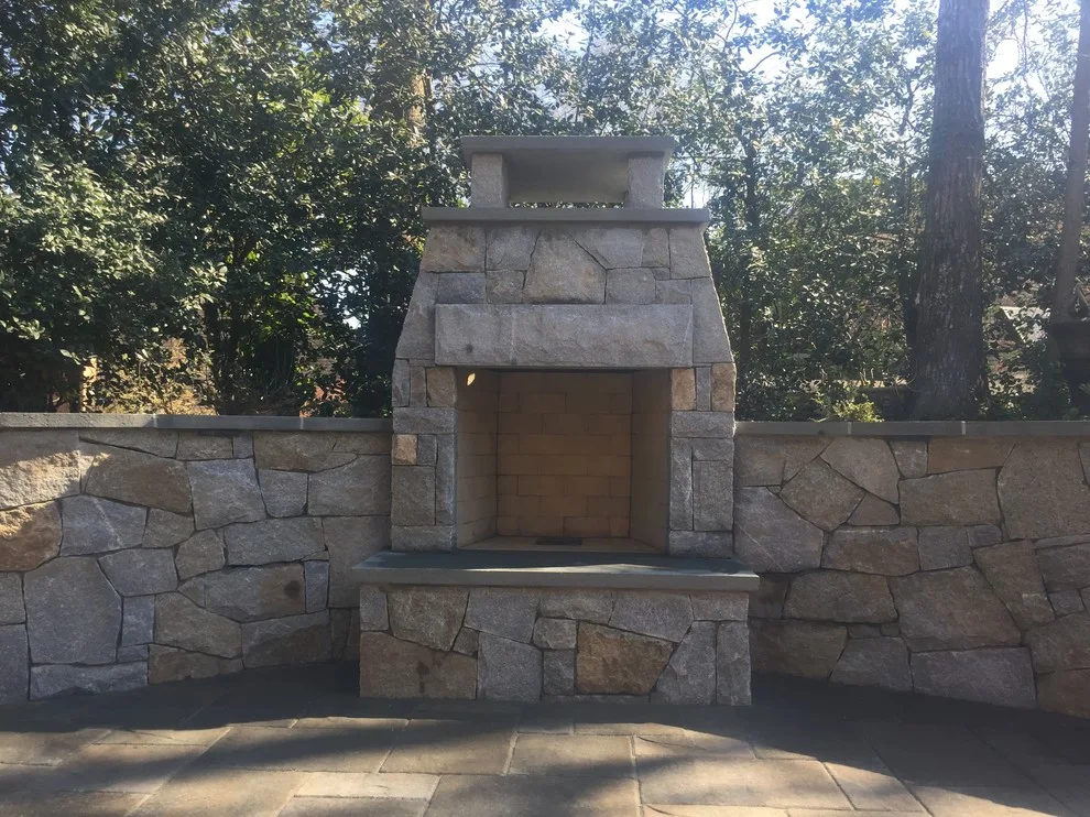 Dunwoody compact outdoor space featuring a fireplace by PaverStone Construction And Greenmark Landscaping - Photo 4