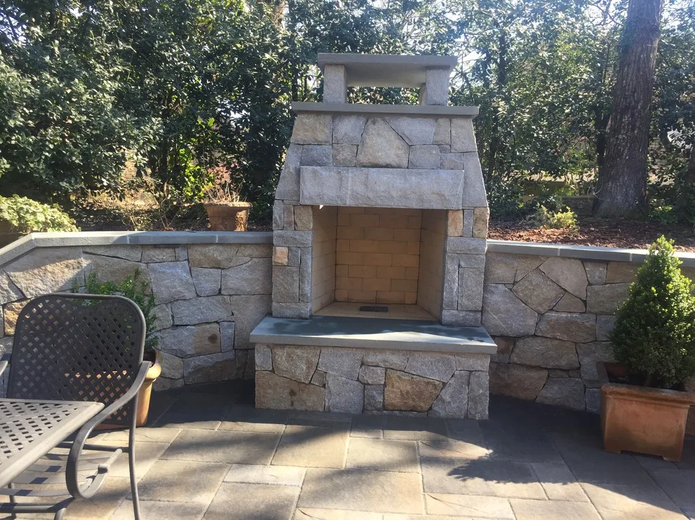 Dunwoody compact outdoor space featuring a fireplace by PaverStone Construction And Greenmark Landscaping - Photo 15