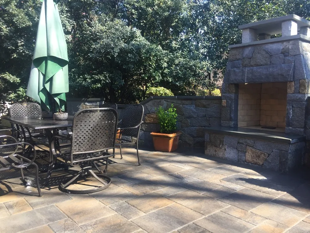 Dunwoody compact outdoor space featuring a fireplace by PaverStone Construction And Greenmark Landscaping - Photo 11