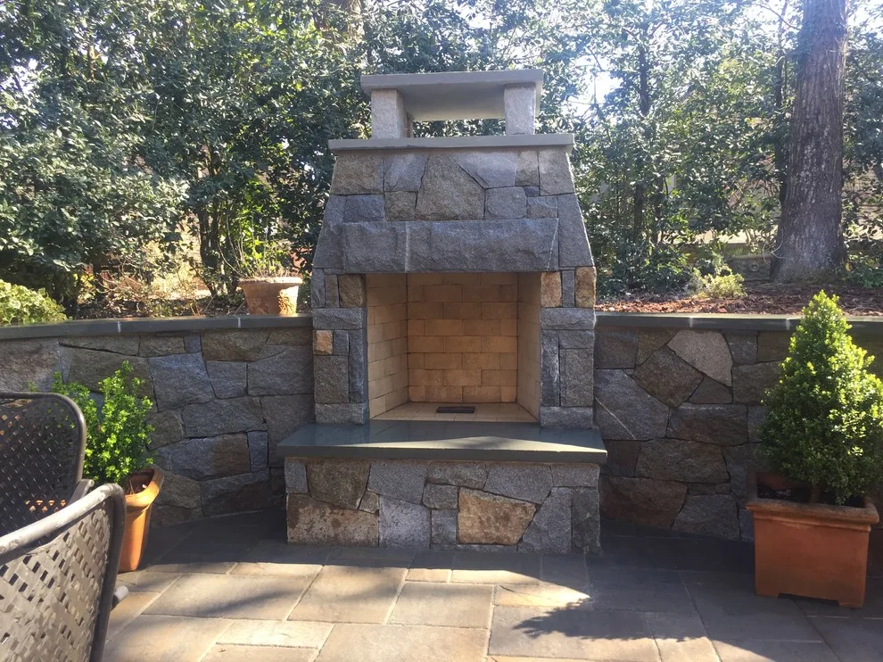 Dunwoody compact outdoor space featuring a fireplace by PaverStone Construction And Greenmark Landscaping - Photo 3