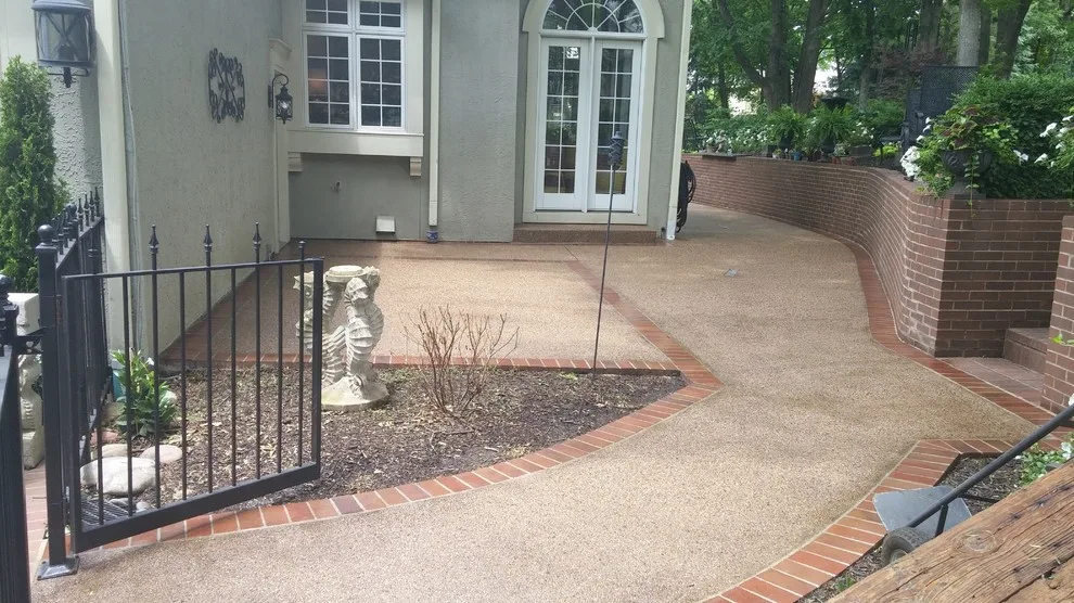 Aggregate patio with brick edging by Moser Contracting - Photo 2