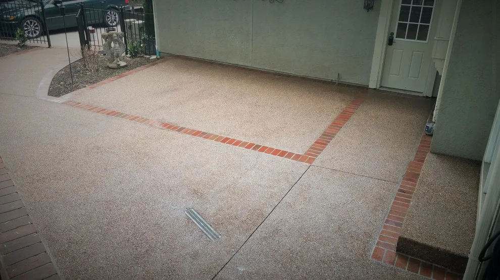 Aggregate patio with brick edging by Moser Contracting - Photo 3