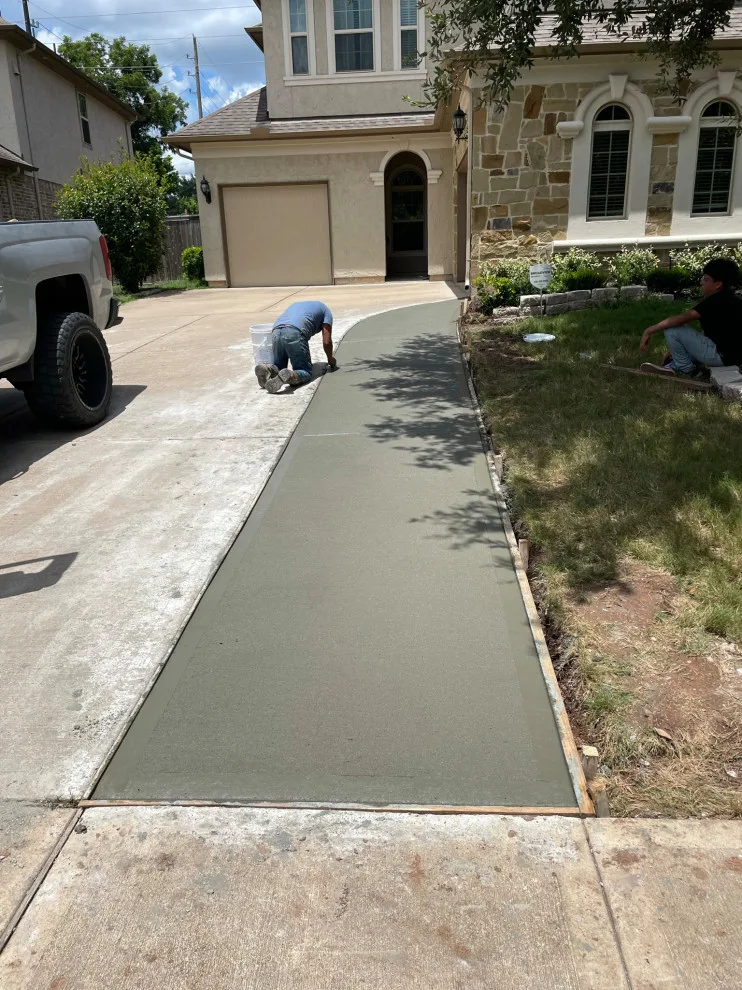 Sidewalk and Driveway Extension by Flores Concrete - Photo 9