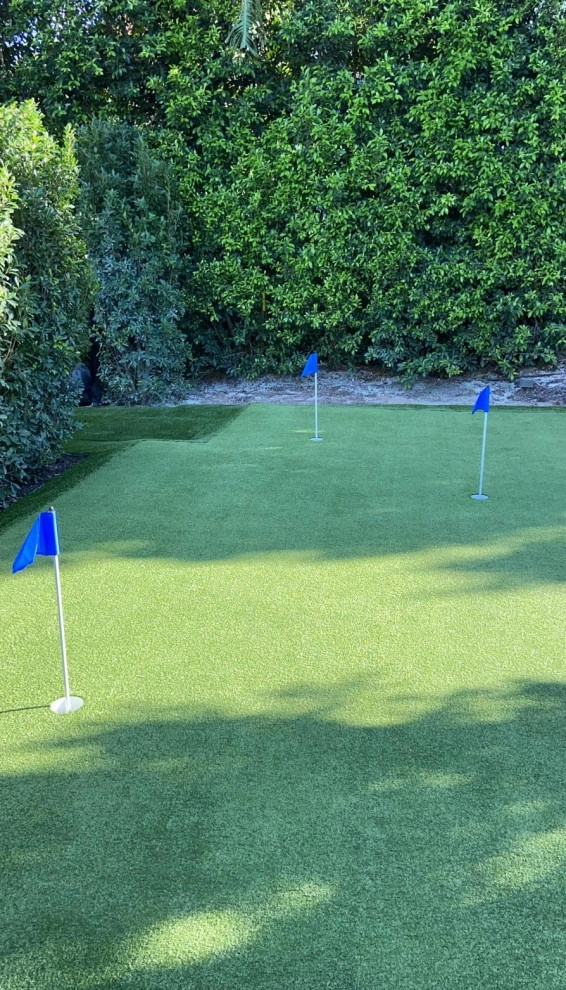 PUTTING GREEN WITH ARTIFICIAL TURF by The Landscaping People, Inc. - Photo 3