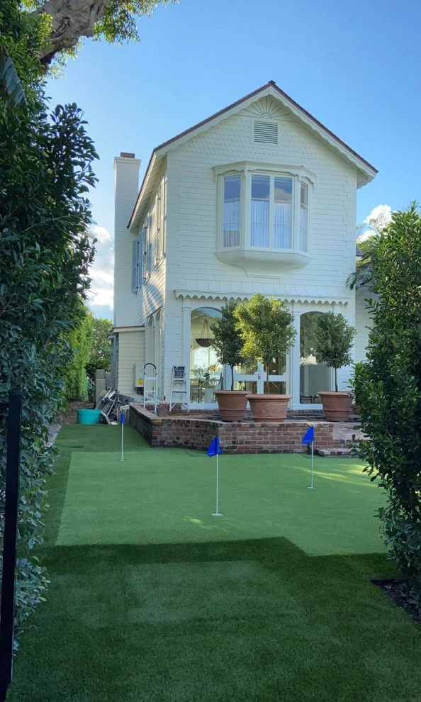 PUTTING GREEN WITH ARTIFICIAL TURF by The Landscaping People, Inc. - Photo 10