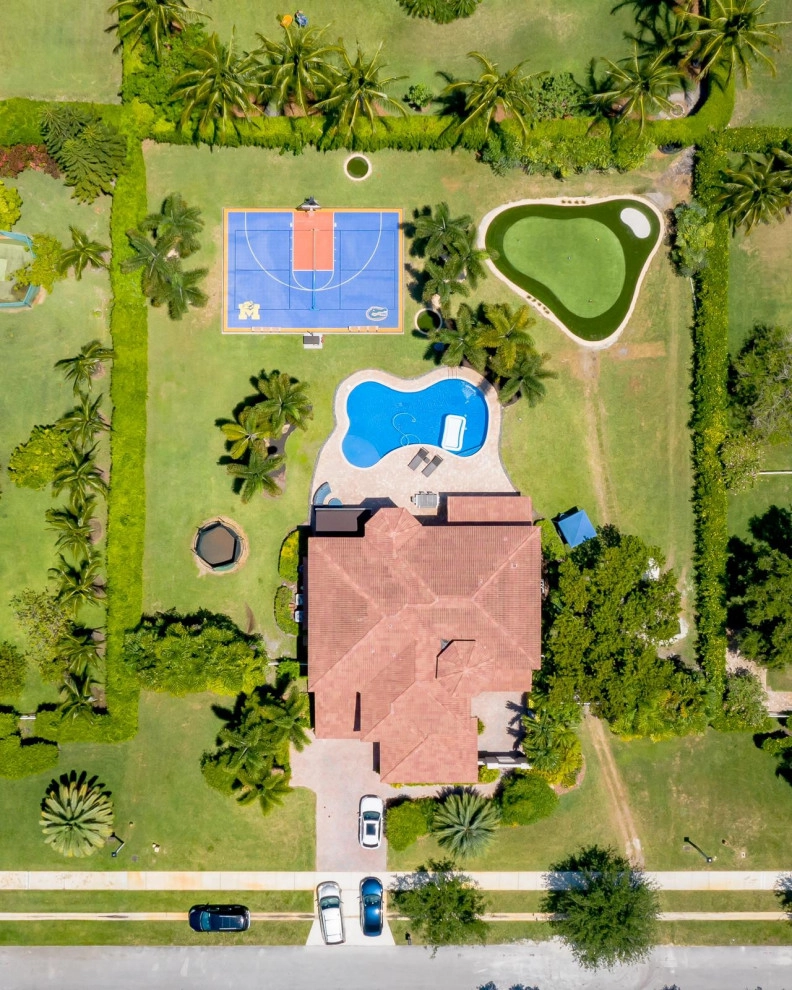 PRIVATE BACKYARD CELEBRITY GREENS PUTTING GREEN by The Landscaping People, Inc. - Photo 7