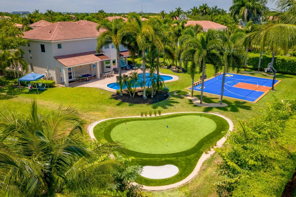 PRIVATE BACKYARD CELEBRITY GREENS PUTTING GREEN by The Landscaping People, Inc. - Photo 12