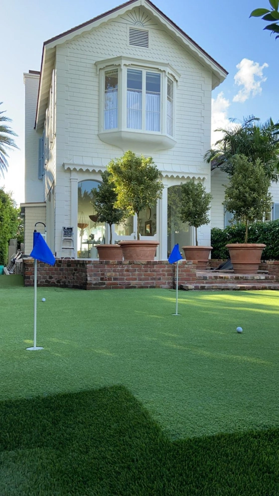 PUTTING GREEN WITH ARTIFICIAL TURF by The Landscaping People, Inc. - Photo 5