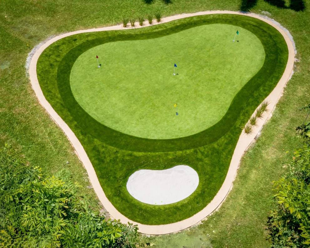 PRIVATE BACKYARD CELEBRITY GREENS PUTTING GREEN by The Landscaping People, Inc. - Photo 9