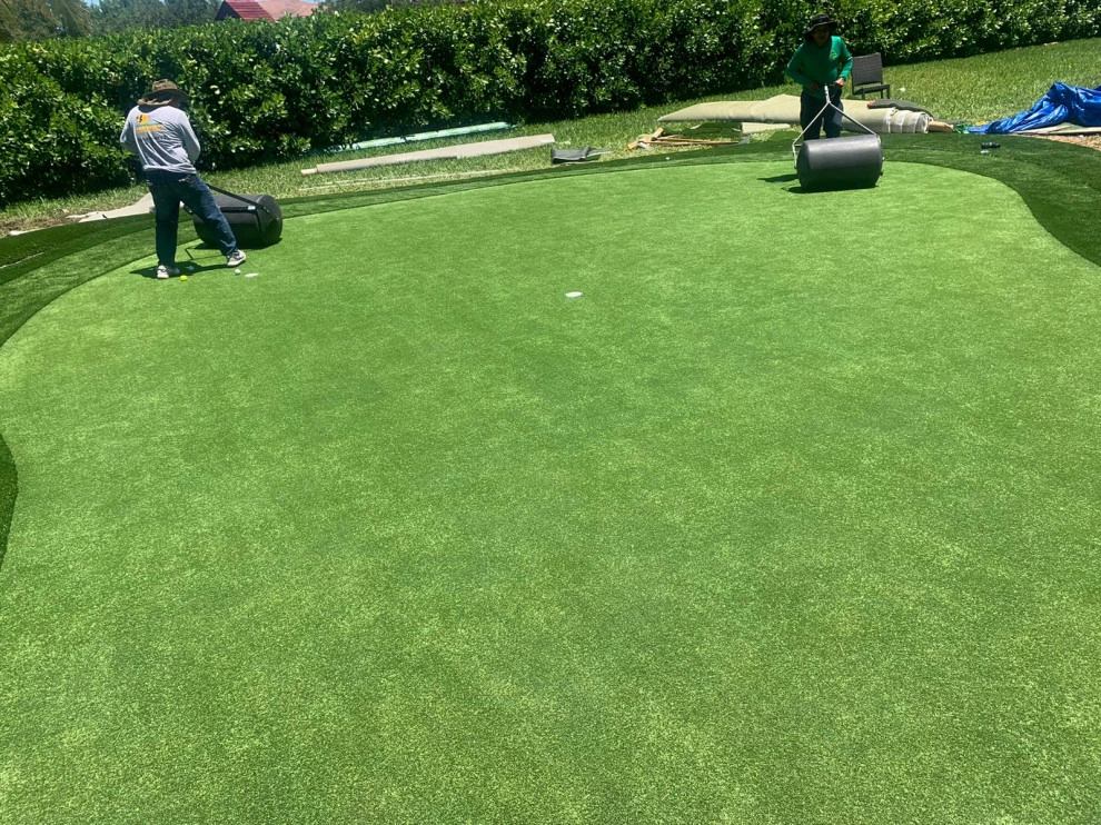 PRIVATE BACKYARD CELEBRITY GREENS PUTTING GREEN by The Landscaping People, Inc. - Photo 10