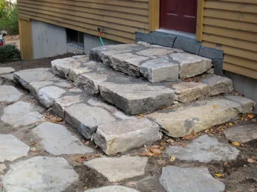 Landscaped stairs, walls, and pathways by Rock Solid Solutions - Photo 20