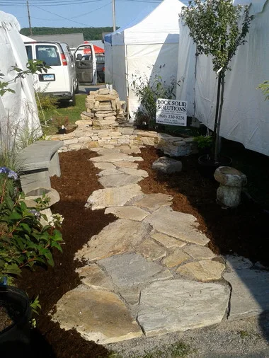Landscaped stairs, walls, and pathways by Rock Solid Solutions - Photo 6