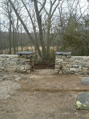 Landscaped stairs, walls, and pathways by Rock Solid Solutions - Photo 30