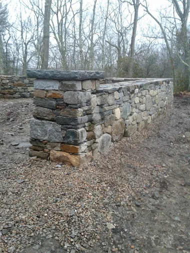 Landscaped stairs, walls, and pathways by Rock Solid Solutions - Photo 21