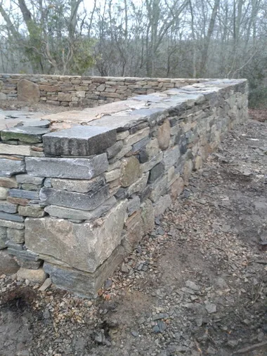 Landscaped stairs, walls, and pathways by Rock Solid Solutions - Photo 32