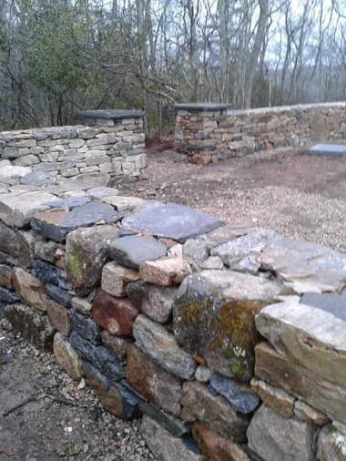 Landscaped stairs, walls, and pathways by Rock Solid Solutions - Photo 39