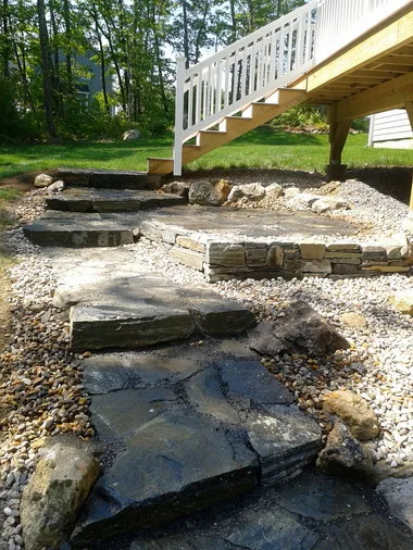 Landscaped stairs, walls, and pathways by Rock Solid Solutions - Photo 19