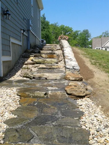 Landscaped stairs, walls, and pathways by Rock Solid Solutions - Photo 26