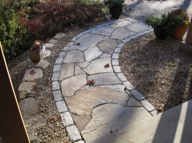 Landscaped stairs, walls, and pathways by Rock Solid Solutions - Photo 37