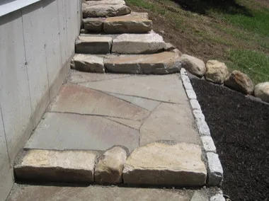 Landscaped stairs, walls, and pathways by Rock Solid Solutions - Photo 28