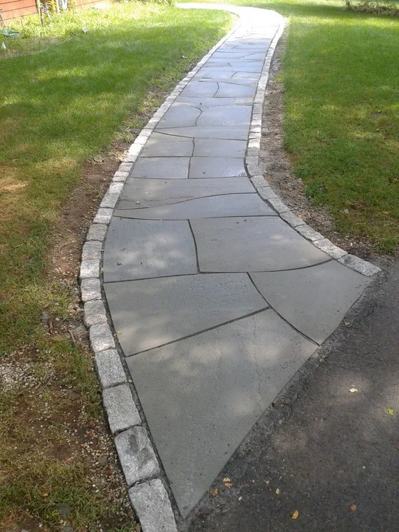 Landscaped stairs, walls, and pathways by Rock Solid Solutions - Photo 13